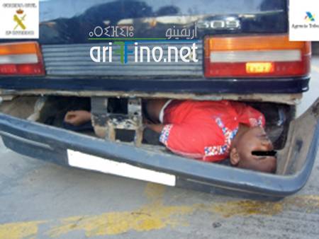 Inmigrante_en_el_doble_fondo_d