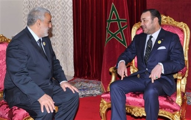 In this photo provided by the Moroccan Royal Palace, King Mohammed VI, right, receives Abdelilah Benkirane, the secretary general of the Justice and Development Party, to appoint him as the head of the country's new government, in the mountain town of Midelt, Morocco, Tuesday, Nov. 29, 2011. The Islamist party took 107 seats out of the 395 in Parliament in Friday's election - almost twice as many as the second-place finisher. It must now assemble a governing coalition. Several parties have already expressed their interest in an alliance. (AP Photo/Azzouz Boukallouch)